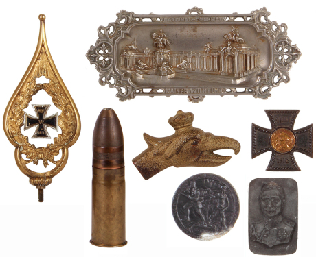 Seven assorted military items, includes 6.3" artillery shell, brass & iron 1914/Iron Cross; Iron Cross 1916; metal ashtray National Denkmal, Kaiser Wilhelm I; relief metal plaque Wilhelm II; iron eagle; iron plaque Inft. Regt. Wien Nr. 24 1914 1917, good