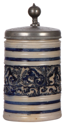 Stoneware stein, 8.8'' ht., early 1700s, Westerwälder Walzenkrug, applied relief, blue saltglaze, animals & leaves, pewter lid is an old replacement [dated 1802], minor flakes on relief design.