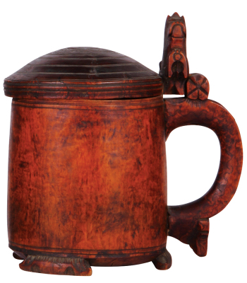 Wood tankard, 1.5L, 9.5'' ht., early 1800s, Norwegian, burl, footed, lion thumblift, carved lid, flaw on lid, otherwise very good condition.