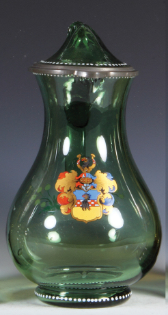 Glass pitcher, 10.1'' ht., blown, green, hand-painted coat-of-arms, matching glass inlaid lid, unusual bent over finial design forms thumblift, mint.