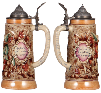 Two pottery steins, .5L, relief, by Diesinger, 53 & 777, pewter lids, first has dented lid, otherwise mint.  - 3