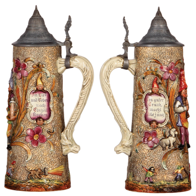 Two pottery steins, 1.0L, relief, by Diesinger, 875 & 513, pewter lids, both have small chips on relief.  - 2