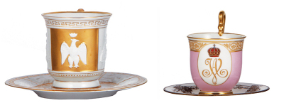 Two porcelain cups & saucers, 7.2'' d., 4.2'' ht., marked crown & N, relief, gilded, eagle, mint; with, 5.5'' d., 4.8'' ht., marked K.P.M., hand-painted, saucer marked K.P.M., is not original with cup, mint.