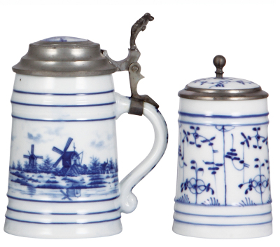 Two porcelain steins, .5L, hand-painted, Delft, porcelain inlaid lid, lines in lithophane, pewter cut has a good repair; with, 3L, hand-painted, porcelain inlaid lid, lithophane, good condition.