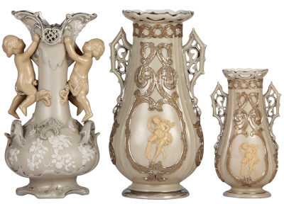 Three Mettlach vases, 6.7" to 9.9" ht., vase, 227, early ware, platinum wear; with, 319, early ware, chip on edge of relief, platinum wear; 319, platinum wear. 