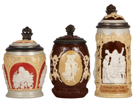 Three Mettlach steins, .5L, 1266, relief, inlaid lid, poorly repaired crack; with, .5L, 1028, relief, inlaid lid, inlay is severely broken; with, .5L, 1005, relief, inlaid lid, chips on inlay.