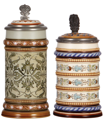 Two Mettlach steins, .5L, 1654, mosaic, inlaid lid, hairline repair in rear by handle; with, .5L, 1148, mosaic, inlaid lid, hairlines on body & inlay.