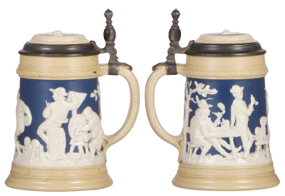 Two Mettlach steins, .5L, 2182, relief, inlaid lid, some interior browning; with, .5L, 2358, relief, inlaid lid, some interior browning, two upper rim flakes.    - 2