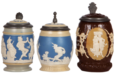 Three Mettlach steins, .25L, 2086, relief, inlaid lid, mint; with, .3L, 2211, relief, inlaid lid, base chip repaired; with, .5L, 1028, relief, inlaid lid, mint. 