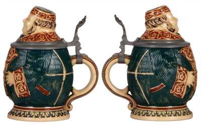 Two Character steins, .5L, pottery, marked M. & W. Gr., Wealthy Man, mint; .5L, pottery, 825, Frog, chips on lid repaired.  - 2