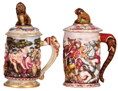 Two porcelain steins, .3L, 8.0" ht., hand-painted & relief, marked N with crown, Capo-di-Monte, set-on lid, mint; with, .3L, 7.5" ht., marked N with crown, Capo-di-Monte, set-on lid, flake on lid, otherwise mint.