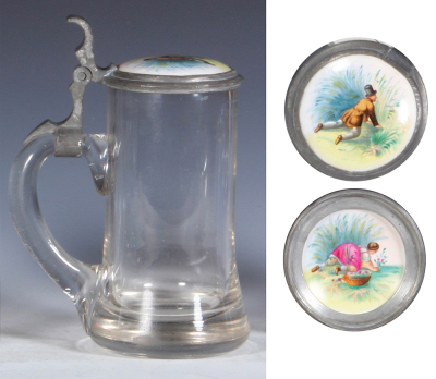 Two glass steins, .5L, pressed, pewter lid: Bismarck, mint; with, .5L, blown, porcelain inlaid lid, scenes inside & outside, pewter rim has some roughness, otherwise mint. - 5