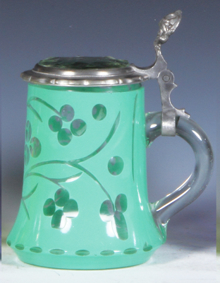 Two glass steins, .5L, blown, clear, green painted overlay, cut clear glass inlaid lid, pewter polished, otherwise mint; with, .5L, blown, clear, crushed glass finish, hand-painted, Johannisbad, matching glass inlaid lid, mint. - 2