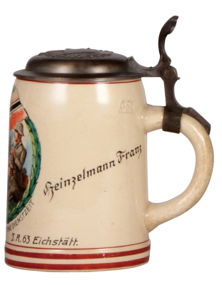 Third Reich stein, .5L, pottery, 17. [E.M.G.] Komp., I.R. 63, Eichstätt, owner's name, replacement pewter lid with relief helmet with swastika, color wear to red on flag. - 2