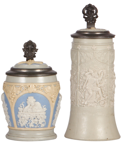 Two Mettlach steins, .5L, 1266, relief, inlaid lid, interior browning, otherwise mint; with, .5L, 228, earlyware, inlaid lid, mint,