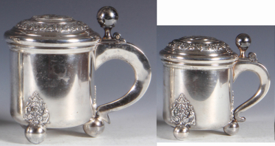 Two silver-plated tankards, .5L, 6.2" ht., marked EPNS made in Sweden, mid 1900s, silver-plated lid with coin casting in center, mint; with, .3L, 4.8" ht., marked EPNS made in Sweden, mid 1900s, silver-plated lid with coin casting in center, mint. 
