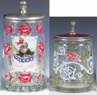 Two glass steins, .5L, blown, enameled, Lamm Gottes, pewter lid, some gold wear, otherwise mint; with, .5L, blown, c.1860, cut, enameled, ruby-flashed glass inlaid lid: wheel-engraved, St. Klara, mint.