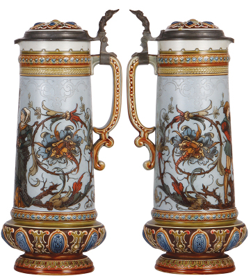 Two Mettlach steins, 2.4L, 14.8'' ht., 2065, etched, by H. Schlitt, inlaid lid, base repaired; with, 2.1L, 14.5'' ht., 1734, etched, by C. Warth, inlaid lid, cracks in rear & inlay repaired poorly. - 3