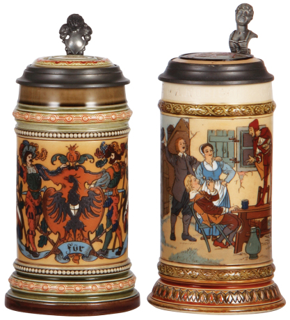 Two Mettlach steins, .5L, 1520, etched, by Gorig, inlaid lid, very good handle repair; with, .5L, 2582, etched, by F. Quidenus, inlaid lid, inscription dated 1900 on top rim of body, very well done, mint.