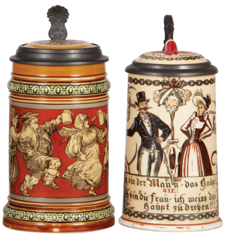 Two Mettlach steins, .5L, 2057, etched, inlaid lid, mint; with, .5L, 2050, etched, figural inlaid lid, base chip repaired, finish color needs to be added.