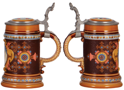 Two Mettlach steins, .5L, 2776, etched, inlaid lid, very good base chip repair; with, .5L, 1454, etched, inlaid lid, interior of body painted, color has changed. - 3