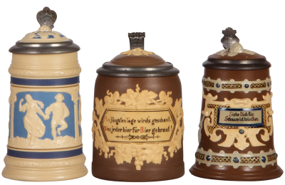 Three Mettlach steins, .3L, 2246, relief, inlaid lid, mint; with, .5L, 1180, relief, inlaid lid, mint; with, .25L, 1745, relief, inlaid lid, mint.