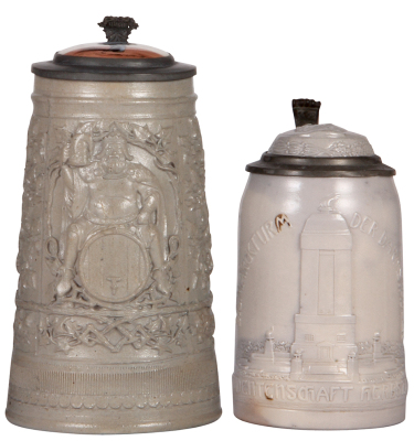 Two stoneware steins, 1.0L, relief, Gambrinus, porcelain inlaid lid: Militärzug, mint; with, .5L, relief, Bismarck Turm Darmstadt, inlaid lid Bismarck, pewter dent, otherwise mint. 