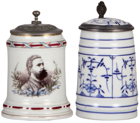 Two porcelain steins, .5L, transfer & hand-painted, Dr. Karl Lueger, pewter lid, a little gold wear; with, .5L, hand-painted, blue onion, inlaid lid, lithophane has lines, otherwise mint. 