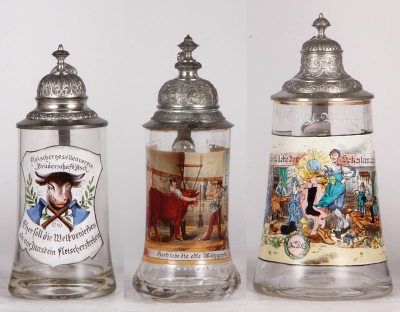 Three glass steins, .5L, transfer, Occupational Fleischer [Butcher], pewter lid, mint; with, .5L, transfer, Occupational Metzger [Butcher], pewter lid, mint; with, 1.0L, transfer, Occupational Schuhmacher [Shoemaker], pewter lid, flake on top rim. From th