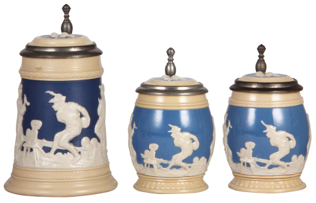 Three Mettlach steins, .5L, 2182, relief; with, two, .3L, 2211, relief, inlaid lids, all mint.