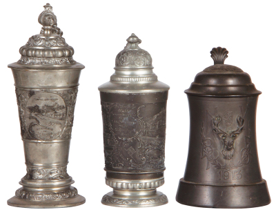 Pewter group, seven items, .5L, St. Louis souvenir, scratches; .3L, relief, Marienburg, good condition; .5L, Elks 1913, relief lid, glass bottom, small base dent; .5L, dice under glass inlay, some wear; .5L, relief, hunter, some wear; beaker, 3.5" ht., Le - 2