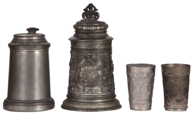 Pewter group, seven items, .5L, St. Louis souvenir, scratches; .3L, relief, Marienburg, good condition; .5L, Elks 1913, relief lid, glass bottom, small base dent; .5L, dice under glass inlay, some wear; .5L, relief, hunter, some wear; beaker, 3.5" ht., Le - 3