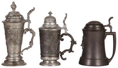 Pewter group, seven items, .5L, St. Louis souvenir, scratches; .3L, relief, Marienburg, good condition; .5L, Elks 1913, relief lid, glass bottom, small base dent; .5L, dice under glass inlay, some wear; .5L, relief, hunter, some wear; beaker, 3.5" ht., Le - 4