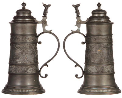 Two pewter steins, 11.2" ht., & 13.5" ht., relief scenes, München, Nürnberg, normal wear, good condition. - 2