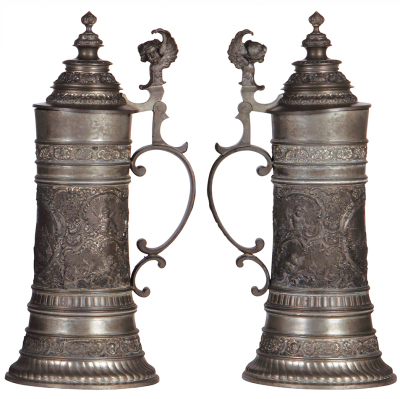 Two pewter steins, 11.2" ht., & 13.5" ht., relief scenes, München, Nürnberg, normal wear, good condition. - 3