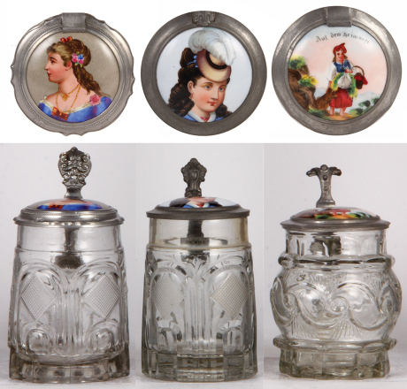 Three glass steins, .5L, mold blown, porcelain inlaid lids, second has a small chip at the bottom of the handle, normal wear, good condition.