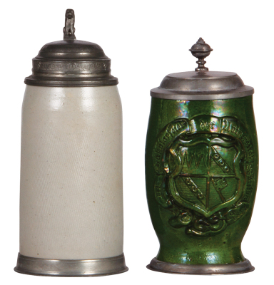 Two steins, stoneware, 1.0L, wheel combed body, pewter lid & base ring, hairline on base; with, pottery, 1.0L, relief, pewter lid & base ring, very good condition.