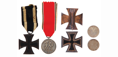 Four German medals, Iron Cross 1914, Second Class, some wear; Commemorative Anschluss of Austria, good condition; Iron Cross 1939, First Class some wear; coin Paul von Hindenburg, 2 Reichs Marks, good condition.