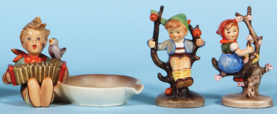 Five Hummel figurines, 6.8" ht., 142/1, TMK 2, Apple Tree Boy, old style base, mint; with, 6.8" ht., 141/1, TMK 2, Apple Tree Girl, old style base, mint; with, 3.4" ht., 114, TMK 2, Let's Sing Ashtray, mint; with, 4.5" ht., 142 3/0, TMK 2, Apple Tree Girl - 3