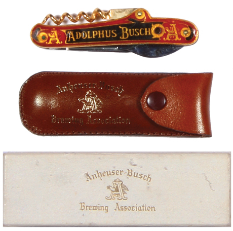 Anheuser-Busch enameled pocket knife, 3.2" l., double-sided design, leather case & original box, no visible stanhope, otherwise good condition.