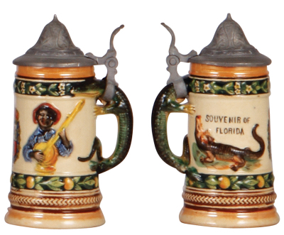 Two pottery steins, .5L, transfer & relief, Souvenir of Jacksonville, FLA., inlaid lid, small flake on band; with, 4.2" ht., relief, Souvenir of Florida, very good condition. - 3