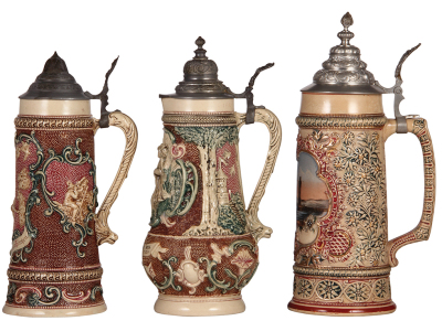 Three Diesinger steins, pottery, 1.0L, 590, relief; with, 1.5L, 12.5" ht., 595, relief; with, 1.0L, transfer & hand-painted, relief, 187, Lindau, browning, all have pewter lids, good condition. - 2