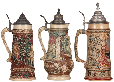 Three Diesinger steins, pottery, 1.0L, 590, relief; with, 1.5L, 12.5" ht., 595, relief; with, 1.0L, transfer & hand-painted, relief, 187, Lindau, browning, all have pewter lids, good condition. - 3