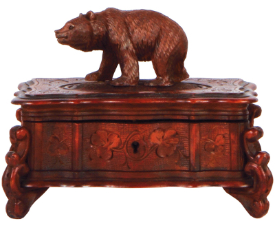 Black Forest wood carved jewel box, 5.4" ht. x 7.1" wide x 4.4" deep, walking bear finial, glass eyes, clover surface carving, made in Switzerland, early 1900s, linden wood, hinged lid, originalÊpaper label from shop in Interlaken Switzerland on bottom, Ê
