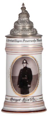 Porcelain stein, .5L, transfer & hand-painted, Occupational Feuerwehrmann [Fireman], 1. Comp. d. Freiwilligen Feuerwehr München 1906, rare, pewter lid, lithophane lines, some color wear on bands in rear. From the Etheridge Collection & pictured in the Occ