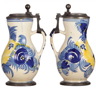 Two faience steins, 9.5" ht., Birnkrug, c.1900, pewter lid and footring are old replacements, a couple of glaze chips; with, 7.5" ht., Walzenkrug, c.1900, pewter lid and footring, fair repair to handle, base chips. - 2