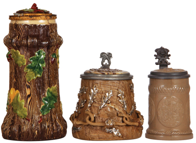 Three Mettlach steins, .5L, relief, tree trunk, inlaid lid, firing lines; with, .5L, 216, tree trunk, inlaid lid, chip on a vine; with, .3L, 1100, relief, inlaid lid, old repair on bottom of handle.