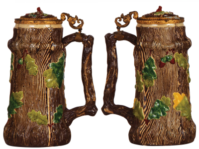 Three Mettlach steins, .5L, relief, tree trunk, inlaid lid, firing lines; with, .5L, 216, tree trunk, inlaid lid, chip on a vine; with, .3L, 1100, relief, inlaid lid, old repair on bottom of handle. - 2