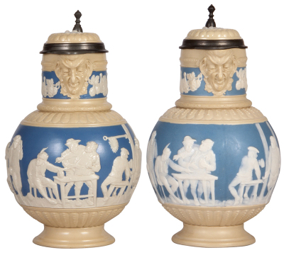 Two Mettlach steins, 3.2L, 12.9" ht., 2210, relief, by Fuchs, inlaid lid, mint; with, 3.2L, 13.2" ht., 2210, cameo, inlaid lid, drilled as lamp, handle flake.