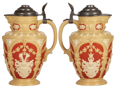 Two Mettlach steins, 1.8L, 10.6" ht., 2076, relief, by M. Hein, original pewter lid, mint; with, 1.8L, 11.2" ht., 2076, relief, by M. Hein, original pewter lid, marked Pauson München, mint. - 2